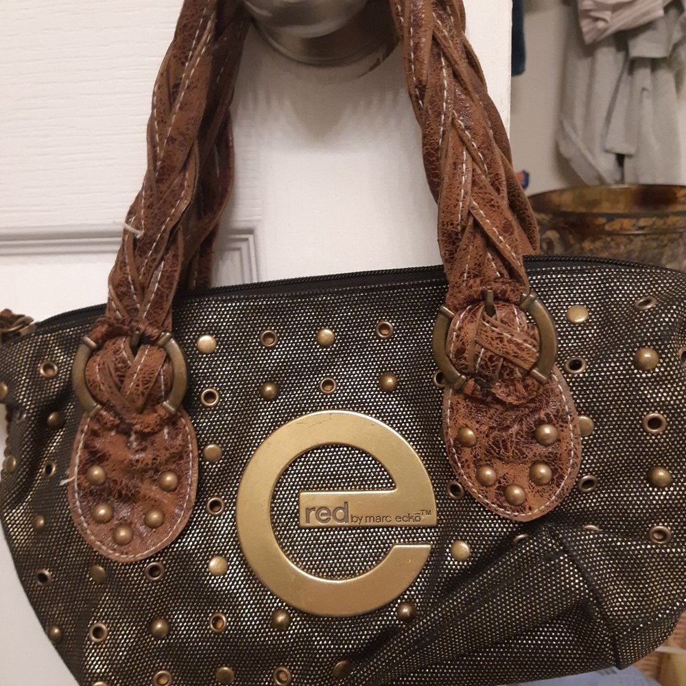 Vintage Mark Ecko Purse Gold with Leather Straps very unique .